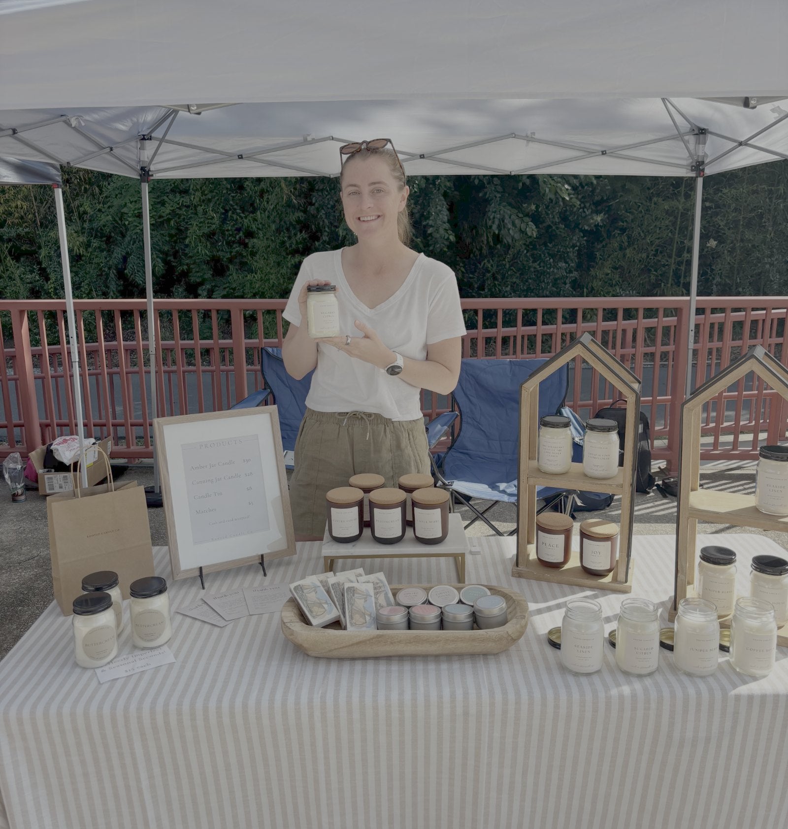 Tracy holding a candle at market